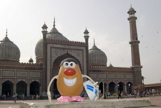 Showing proper respect, Spud removes his footwear inside the mosque of the Jama Masjid