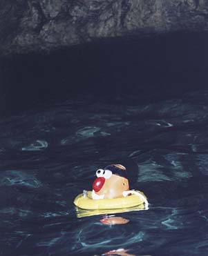 Spud floats into an old pirate cave
