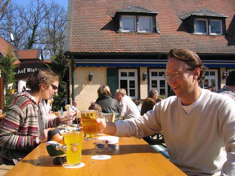 Spud enjoys a pint of apfelwine with one of the locals in Germany