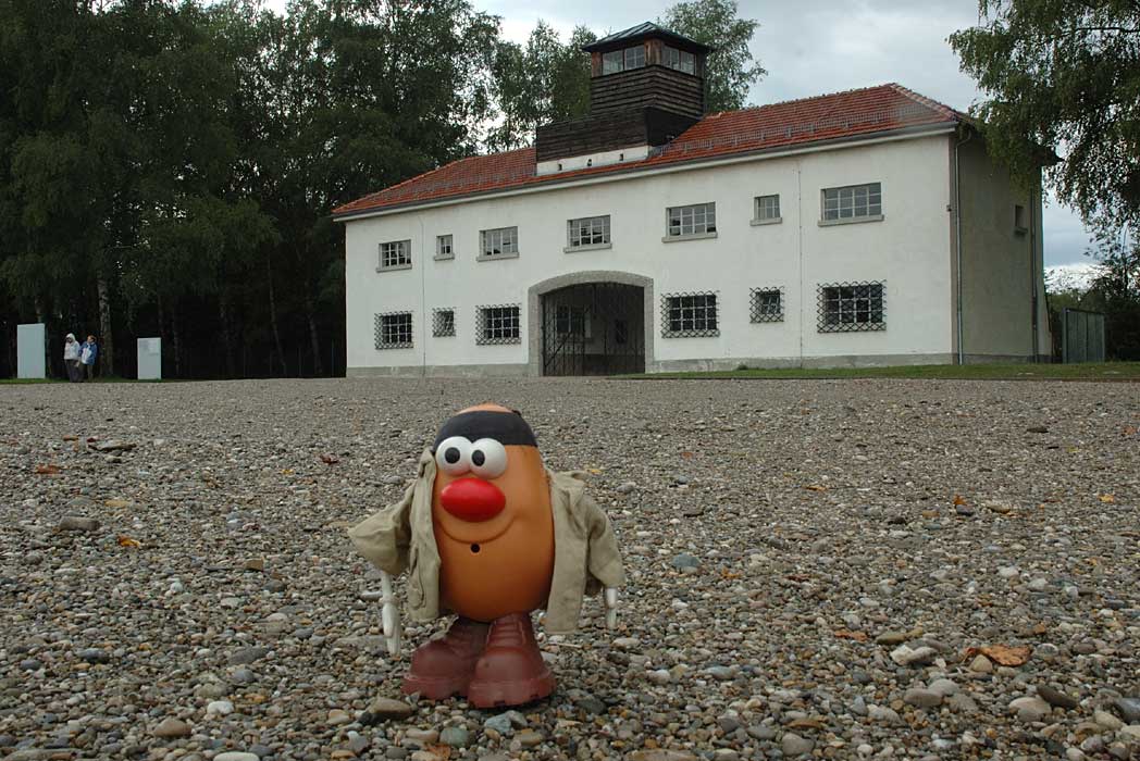 Spud pauses for a moment after entering the main gate of the Dachau Concentration Camp