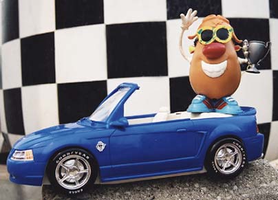 Spud celebrates in Victory Lane after kicking butt on the panty-waist crybabys of the Indy CART circuit