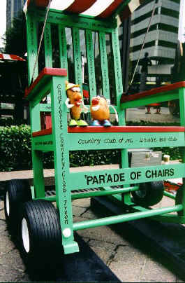 Spud checks out the golf cart rocker with a local