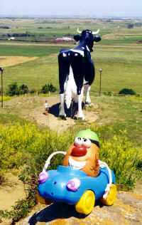 Spud takes a side trip to visit the big bovine