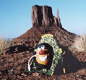 Spud pitches his tent at the foot of Monument Valley's East Mitten butte